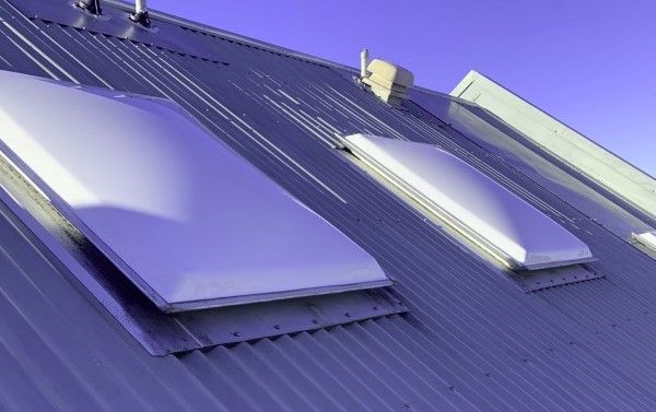 pose de skydome sur toiture en toles